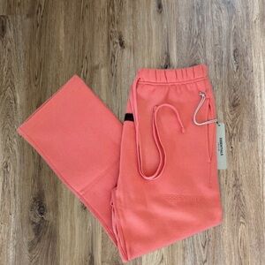 Fear of God Essentials Coral  Relaxed Sweatpants